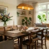 How to design a dining room that works for everyday and entertaining – featured image with extendable table, mixed seating, sideboard, and warm lighting.
