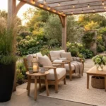 luxury garden decor – featured image of a luxurious garden patio with black planter, warm lighting, and comfortable seating.
